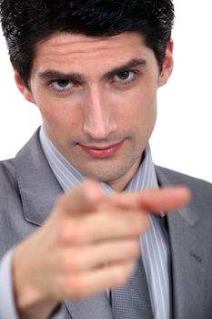 businessman pointing at you