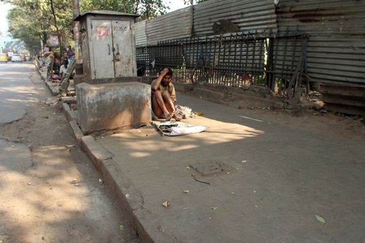 Streets of Kolkata. Thousands of beggars are the most disadvantaged castes living in the streets on November 28, 2012 in Kolkata, India.