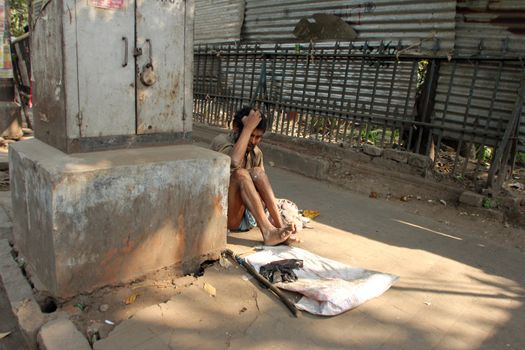 Streets of Kolkata. Thousands of beggars are the most disadvantaged castes living in the streets on November 28, 2012 in Kolkata, India.