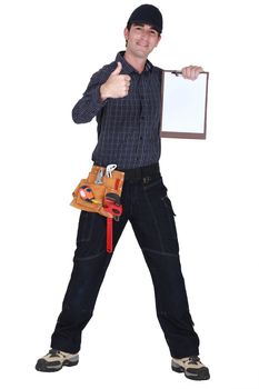 Man with clip-board giving thumbs-up