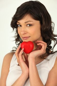 young woman holding a plastic hearth in her hand