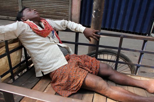 Homeless people sleeping on the footpath of Kolkata. on November 28, 2012 in Kolkata, India.