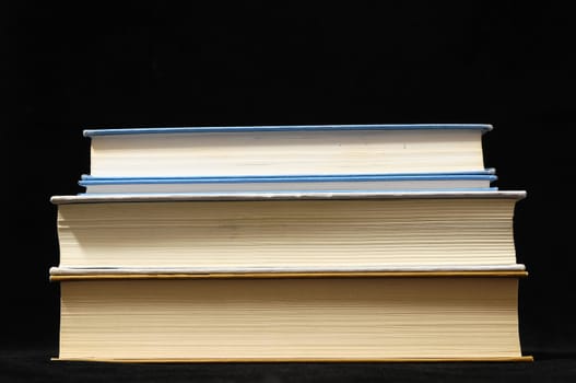 One Empty Book Isolated on a Black Background