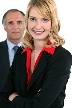 Young businesswoman in front of an older businessman