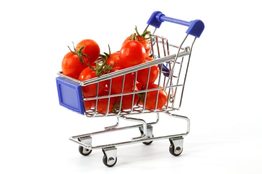 Cherry  tomatoes in shopping cart on white 