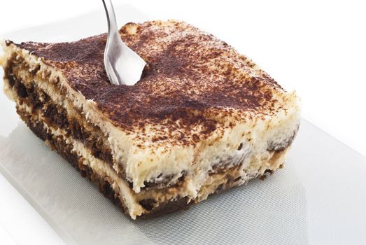 Tiramisu - Italian layered dessert, consisting of the following ingredients: mascarpone cheese, coffee (usually espresso), eggs, sugar and biscuits Savoyardy. Typically, dessert sprinkled cocoa powder
