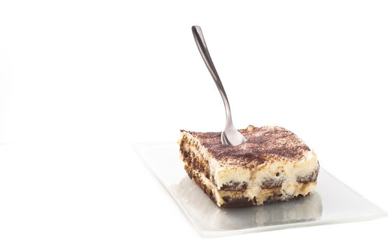 Tiramisu - Italian layered dessert, consisting of the following ingredients: mascarpone cheese, coffee (usually espresso), eggs, sugar and biscuits Savoyardy. Typically, dessert sprinkled cocoa powder
