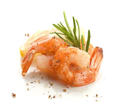 Two roasted shrimp's tails with rosemary and lemon
