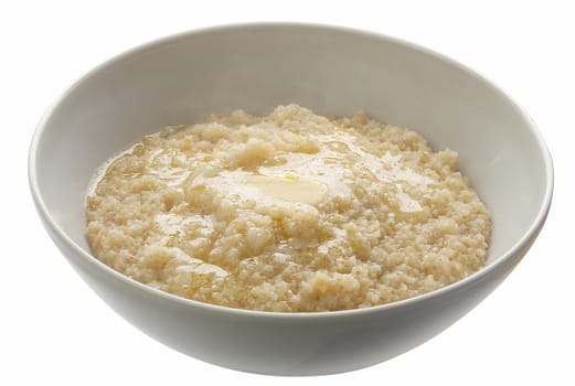 Wheat porridge with butter in the white bowl