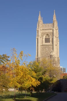 Brick stone tower on blue sky background