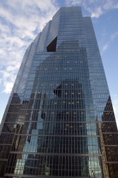 glass wall of a high-rise building in downtown Toronto