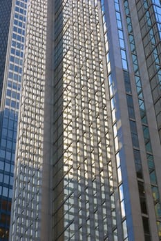 glass wall of a high building in downtown Toronto