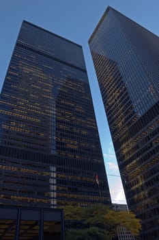 glass wall of a high-rise building in downtown Toronto