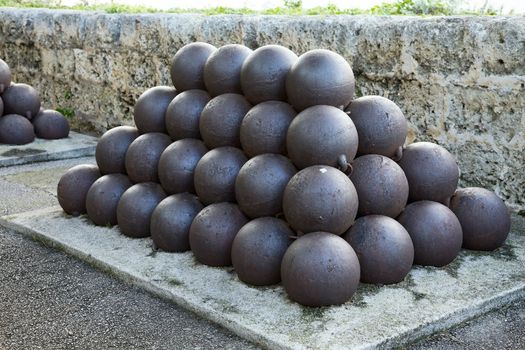 A pile of  cannon balls in a castle