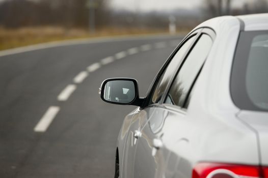 Mirror of a car on the roadside