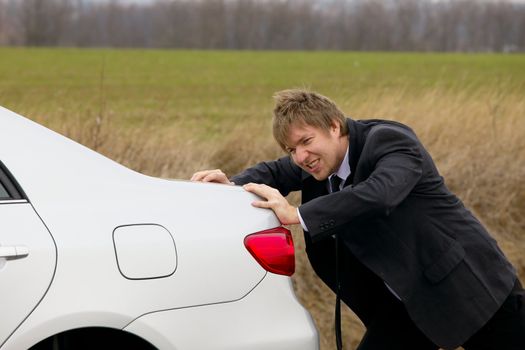 Pushing a broken down car