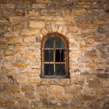 Old wall from the Jerusalem stone and window with lattice window