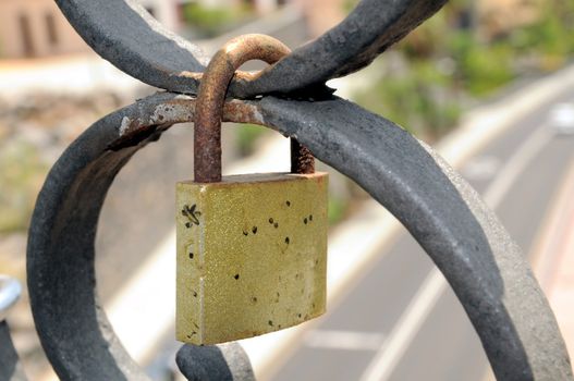 A Colored Metal Lover's Lock on a Bridge