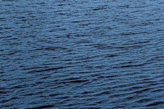 blue water surface on the wind