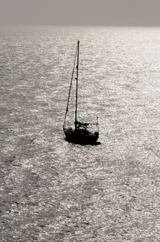 Silhouetted Sailing Boat on the Atlantic Ocean Near Canary Island