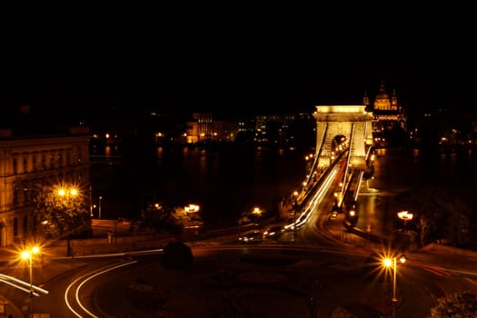 Night image with traffic of the hungarian chain Bridge extremly high donau
