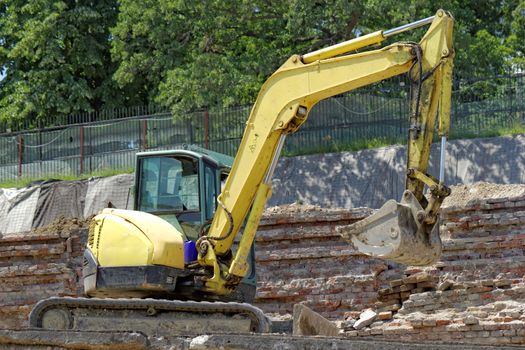 the excavator working on a construction site