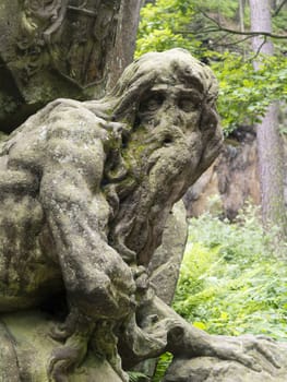 Kuks Forest Sculptures - Hermit Juan Garin - detail of the Baroque sculpture by Matthias Bernard Braun in the Bethlehem of Braun, Kuks, Czech Republic. The Bethlehem of Braun (Czech: Braunuv Betlem) is a complex of Baroque statues and relieves carved by famous sculptor Matthias Bernard Braun directly in sandstone rocks in the forest near complex Kuks Hospital in Northern Bohemia, Czech Republic. Part of the sculptures in the New Forest is ranked the best works of Czech Baroque sculpture. Since 2002, the area is protected as a National Historic Landmark and were listed in the 2000 World Monuments Watch by the World Monuments Fund.