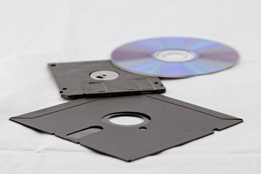 Old Fashion Floppy Disc and Compact Disc ( DVD, CD, CD-RW, DVD-RW )
