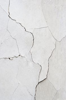 Detail of the cracked stucco - abstract grunge background