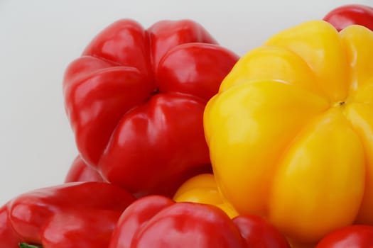 Image of red and yellow raw pepper
