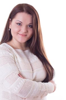 Smiling brunette woman with folded hands on white