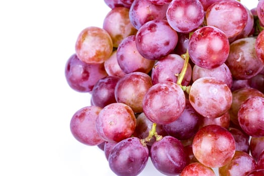 Fresh bunch of red grape on white background