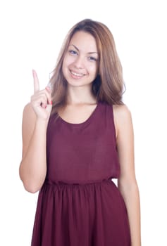 Young beautiful woman presenting. Isolated over white background