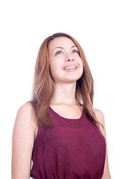 Close-up portrait of a beautiful teenager. Looking up into the corner. Lots of copyspace and room