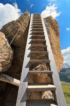 big wooden ladder in Bepi Zac via ferrata, Trentino, Italy