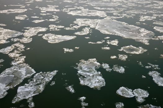 Ice sheets floating on the river