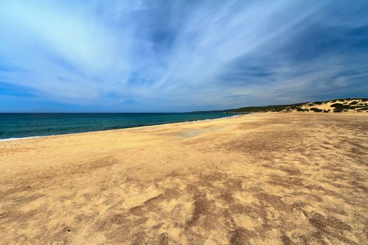 sandy beach in Piscinas, southwest Sardinia, Italy