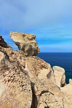 rocks eroded by the wind on the island of San Pietro, Sardinia, Italy