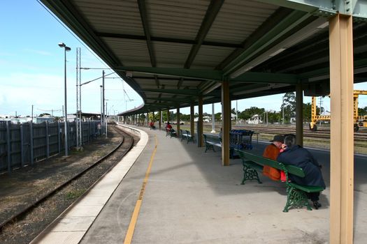 People is waiting for the train in platform