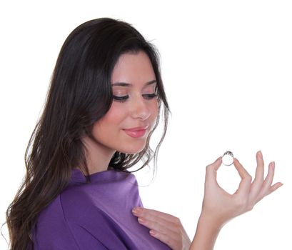 Young beautiful woman showing her engagement ring