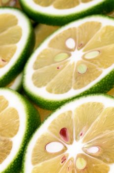 Background of Green Lemon Slices closeup