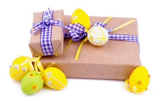 Two Gift Boxes with Checkered Ribbons and Decorated Easter Eggs isolated on white background