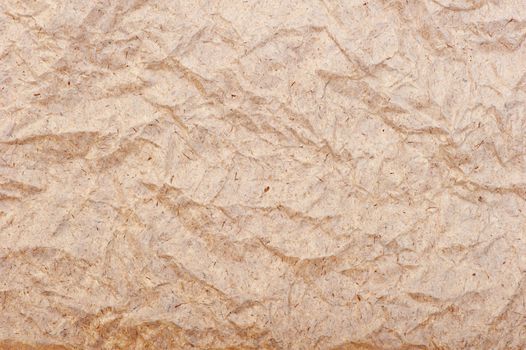 old wrinkled brown paper close-up, background