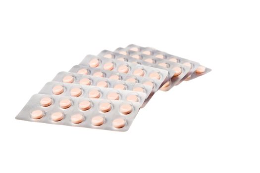 Medication in a tablet bubble pack on isolated white background