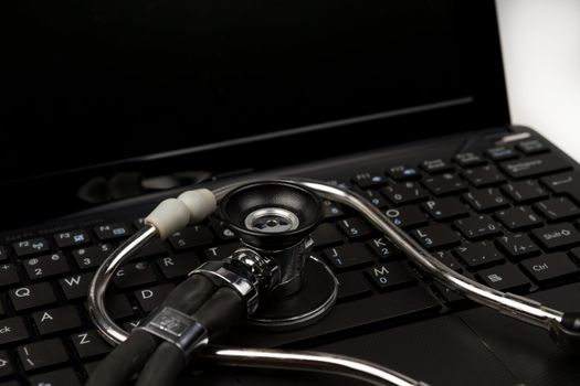 Stethoscope on computer netbook