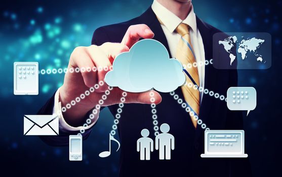 Cloud computing connection concept with business man on a blue technology background