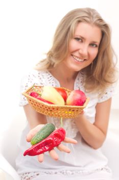 beautiful young woman with fruits and vegetables