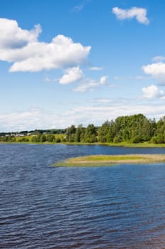 Landscape with villadge and lake in summer day
