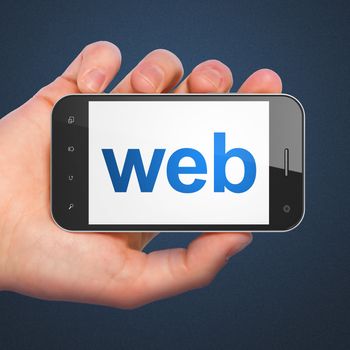 SEO web development concept: hand holding smartphone with word Web on display. Generic mobile smart phone in hand on Dark Blue background.