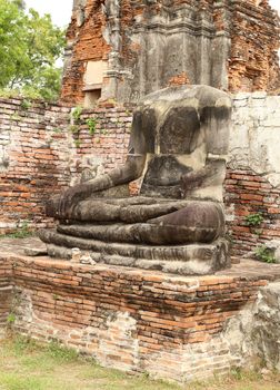 damage buddha statue in wat mahathat temple, Ayutthaya. Thailand